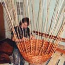A local weaver makes the wicker basket.