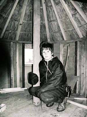 Early stage showing the interior with its thatched roof. 